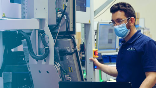 man working on automation equipment